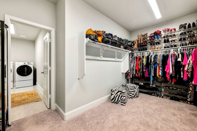 27688 Vivace Dr, Spring, TX 77386 - walk in closet with carpet floors and separate washer and dryer