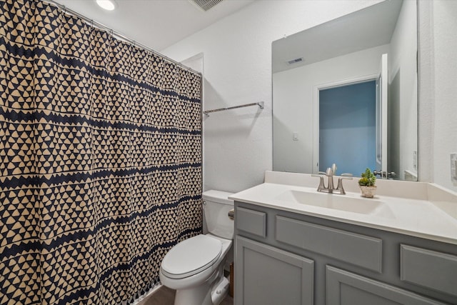 7203 Mayapple Grove Ln, Katy, TX 77493 - bathroom featuring vanity, a textured wall, and curtained shower