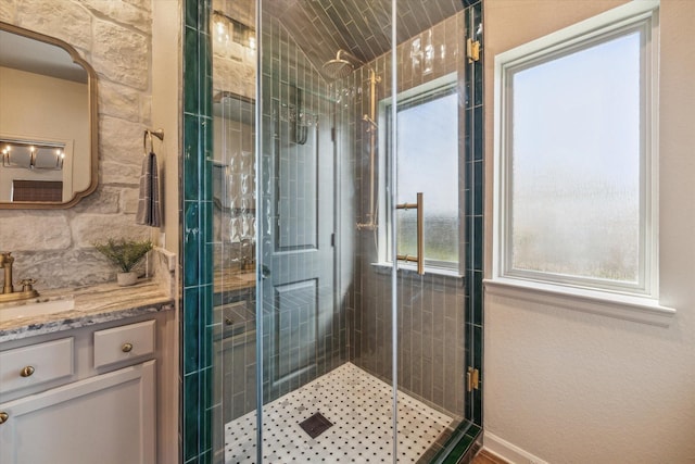 7203 Mayapple Grove Ln, Katy, TX 77493 - bathroom with a stall shower, healthy amount of natural light, and vanity