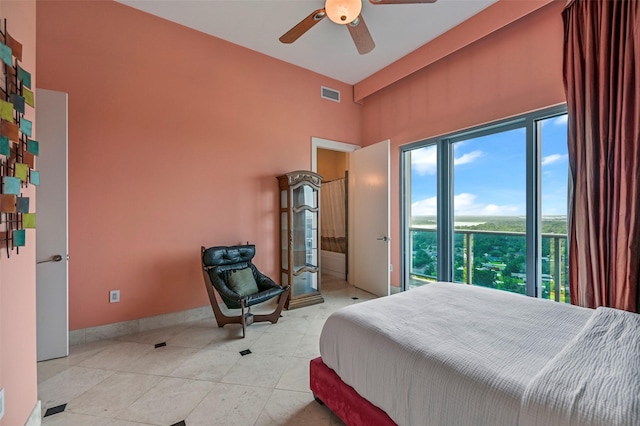 4821 Nasa Pkwy Unit 18W, Seabrook, TX 77586 - bedroom with a high ceiling, light tile patterned floors, and ceiling fan