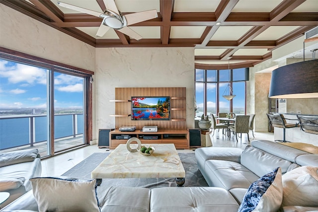 4821 Nasa Pkwy Unit 18W, Seabrook, TX 77586 - living room with coffered ceiling, healthy amount of natural light, ceiling fan, a high ceiling, and beam ceiling