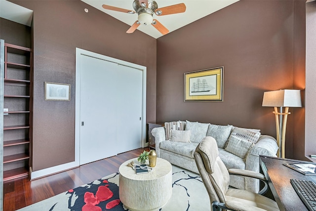 4821 Nasa Pkwy Unit 18W, Seabrook, TX 77586 - living room featuring wood finished floors, a ceiling fan, and an office area