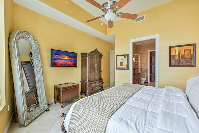 4821 Nasa Pkwy Unit 18W, Seabrook, TX 77586 - bedroom with light tile patterned flooring and connected bathroom