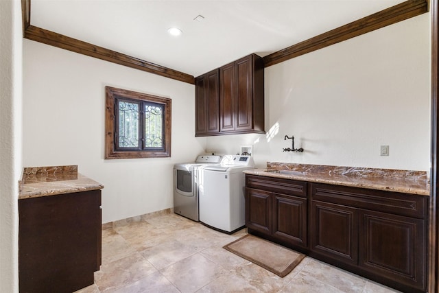 19216 Fm 442nd Rd, Needville, TX 77461 - laundry area featuring cabinet space, separate washer and dryer, crown molding, and recessed lighting