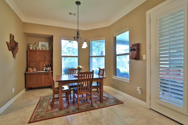 16338 Acapulco Dr, Jersey Village, TX 77040 - dining space with a chandelier, ornamental molding, and light tile patterned floors