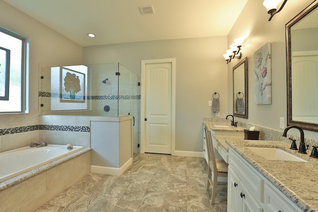 16338 Acapulco Dr, Jersey Village, TX 77040 - full bath with a shower stall, double vanity, a garden tub, and recessed lighting