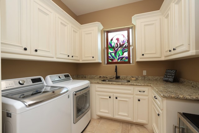 16338 Acapulco Dr, Jersey Village, TX 77040 - laundry area featuring washing machine and clothes dryer, cabinet space, and beverage cooler
