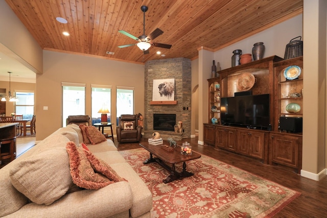 16338 Acapulco Dr, Jersey Village, TX 77040 - living room with wood ceiling, a ceiling fan, dark wood-type flooring, ornamental molding, and a fireplace