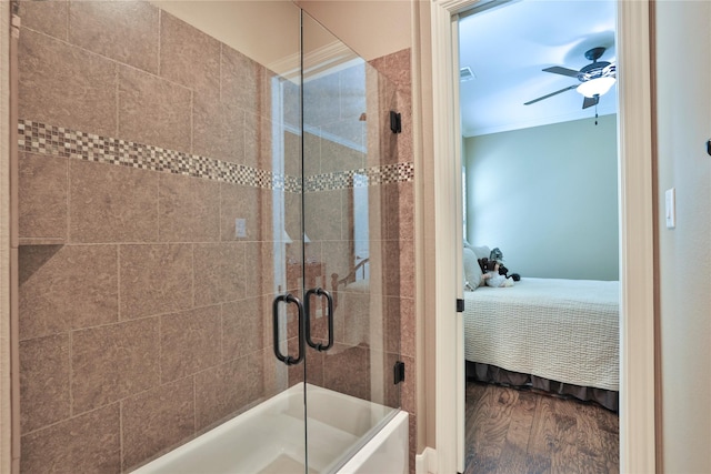 16338 Acapulco Dr, Jersey Village, TX 77040 - ensuite bathroom featuring ornamental molding, a tile shower, wood finished floors, and a ceiling fan