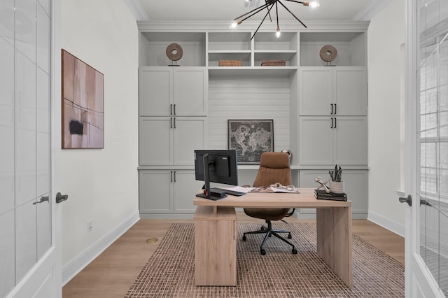 5212 Liberty Cove Dr, Spring, TX 77386 - office area with crown molding, light wood-type flooring, and a chandelier