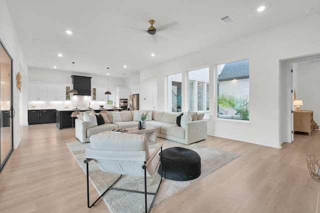 5212 Liberty Cove Dr, Spring, TX 77386 - living room with ceiling fan, light wood-style floors, and recessed lighting