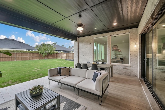 5212 Liberty Cove Dr, Spring, TX 77386 - fenced backyard featuring an outdoor living space and a ceiling fan
