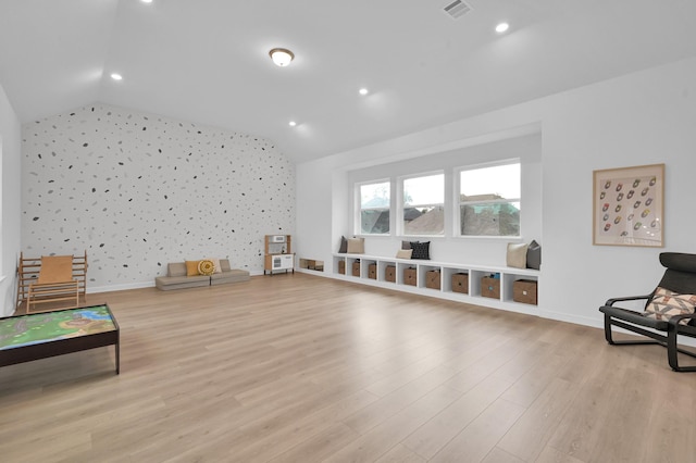 5212 Liberty Cove Dr, Spring, TX 77386 - living area with lofted ceiling, wood finished floors, and recessed lighting