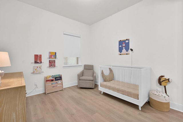 5212 Liberty Cove Dr, Spring, TX 77386 - sitting room with wood finished floors and baseboards