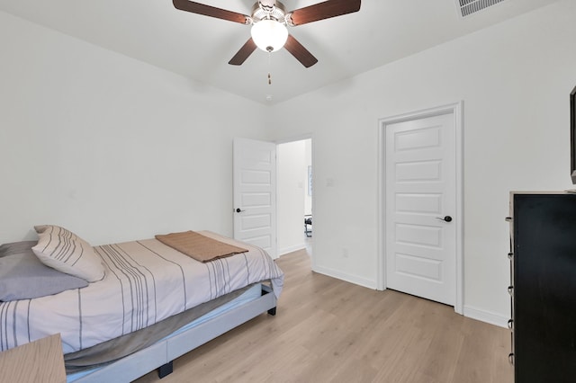 5212 Liberty Cove Dr, Spring, TX 77386 - bedroom with light wood-style floors and a ceiling fan