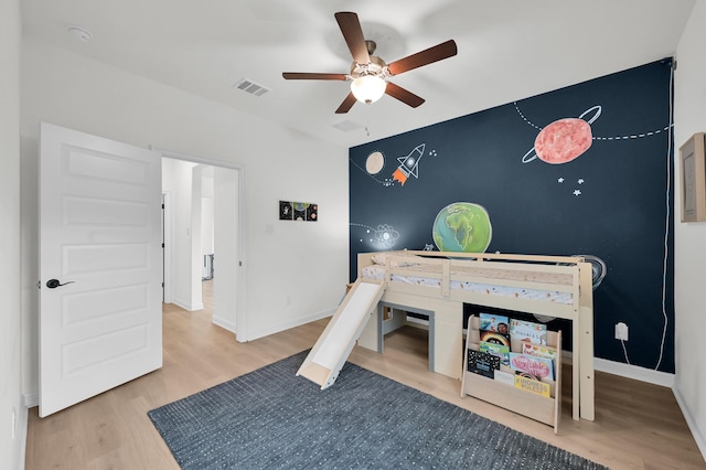 5212 Liberty Cove Dr, Spring, TX 77386 - bedroom with wood finished floors and a ceiling fan