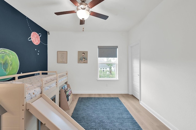 5212 Liberty Cove Dr, Spring, TX 77386 - bedroom featuring wood finished floors and a ceiling fan