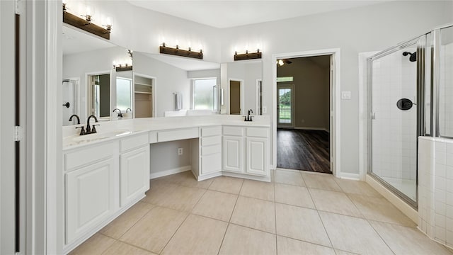 3119 Emory Oak Ln, Pearland, TX 77584 - full bath with double vanity, a stall shower, and tile patterned flooring