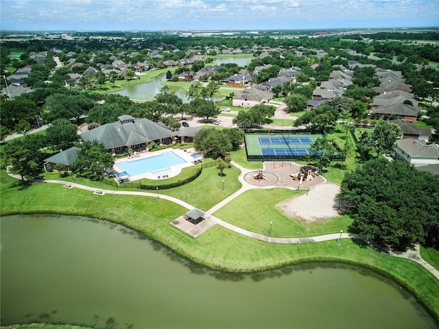 3119 Emory Oak Ln, Pearland, TX 77584 - aerial view of residential area featuring a nearby body of water and a pool area