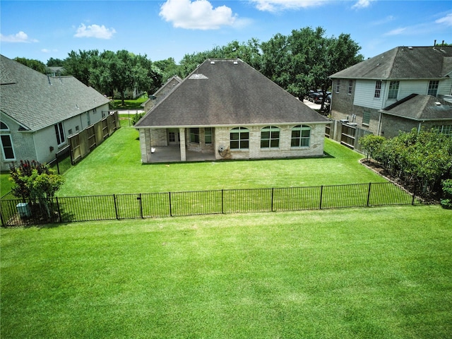 3119 Emory Oak Ln, Pearland, TX 77584 - rear view of property with roof with shingles and a fenced backyard