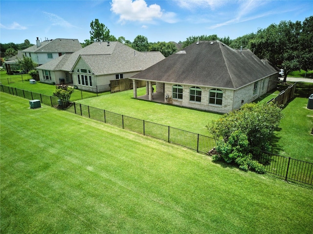 3119 Emory Oak Ln, Pearland, TX 77584 - rear view of property with roof with shingles and a fenced backyard