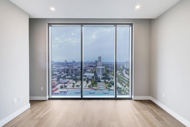 1711 Allen Pkwy Unit 2203, Houston, TX 77019 - empty room featuring wood finished floors