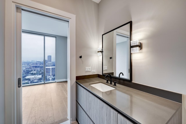 1711 Allen Pkwy Unit 2203, Houston, TX 77019 - bathroom with wood finished floors and vanity