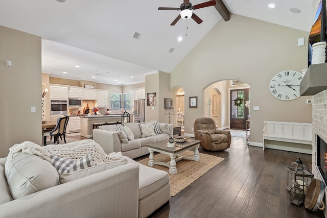 115 Dedication Trl, Huntsville, TX 77340 - living area featuring arched walkways, a ceiling fan, beamed ceiling, dark wood-style flooring, and recessed lighting