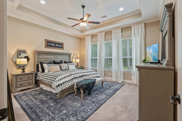115 Dedication Trl, Huntsville, TX 77340 - carpeted bedroom featuring a raised ceiling, ornamental molding, recessed lighting, and ceiling fan