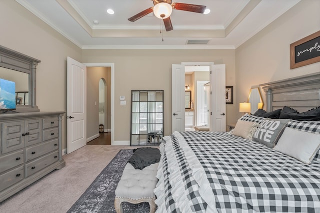 115 Dedication Trl, Huntsville, TX 77340 - bedroom with a tray ceiling, crown molding, carpet, arched walkways, and ceiling fan