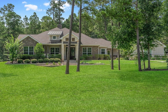115 Dedication Trl, Huntsville, TX 77340 - view of front of house featuring a chimney and a front yard