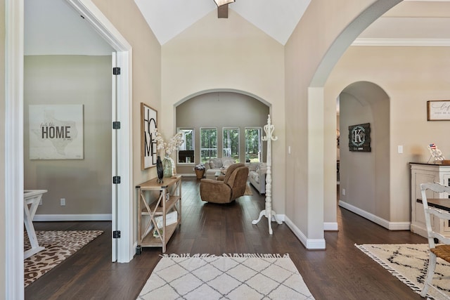 115 Dedication Trl, Huntsville, TX 77340 - foyer entrance with dark wood finished floors, vaulted ceiling, and arched walkways