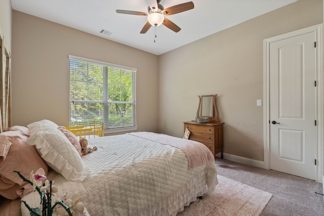 115 Dedication Trl, Huntsville, TX 77340 - bedroom featuring light colored carpet and a ceiling fan