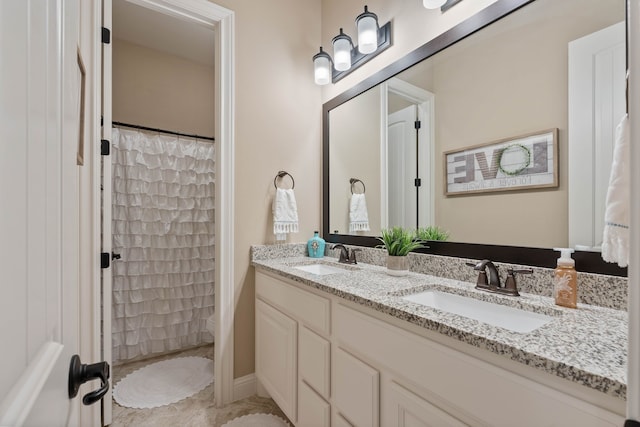 115 Dedication Trl, Huntsville, TX 77340 - bathroom featuring double vanity and a shower with curtain