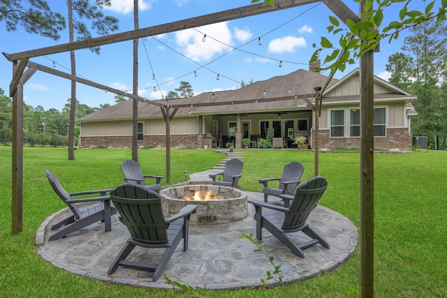 115 Dedication Trl, Huntsville, TX 77340 - view of patio with a fire pit and ceiling fan