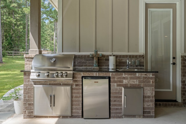 115 Dedication Trl, Huntsville, TX 77340 - view of patio with a sink and exterior kitchen