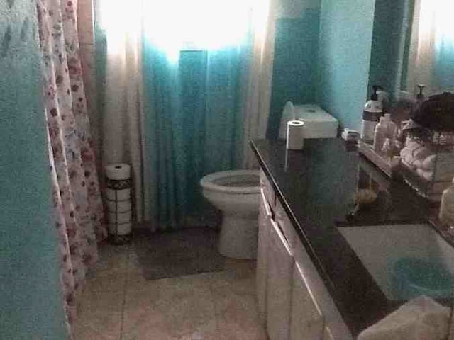 12911 Slater Ln, Houston, TX 77039 - bathroom with vanity and tile patterned flooring