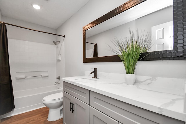 1030 San Felipe Rd, Sealy, TX 77474 - full bath with vanity, wood finished floors, shower / tub combo, and recessed lighting