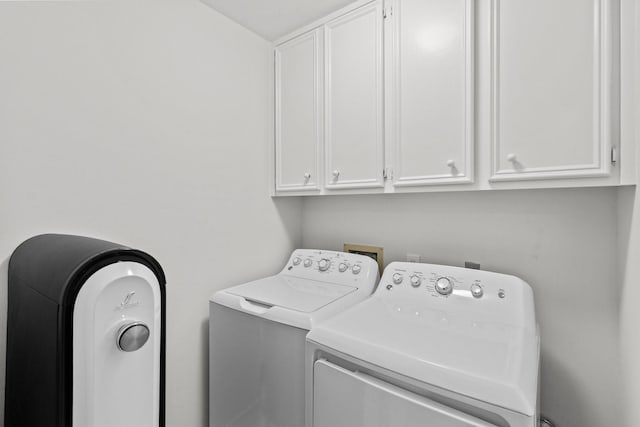 4814 Kirkwall Dr, Sugar Land, TX 77479 - laundry room with washing machine and clothes dryer and cabinet space