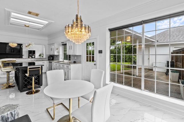 4814 Kirkwall Dr, Sugar Land, TX 77479 - dining area featuring a chandelier, light marble finish floors, healthy amount of natural light, and crown molding
