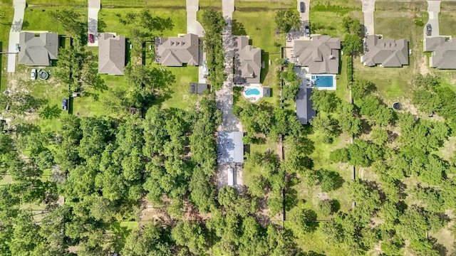 16413 Stonewall St, Conroe, TX 77303 - aerial perspective of suburban area with a pool