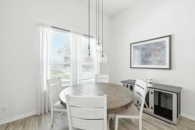16413 Stonewall St, Conroe, TX 77303 - dining area with plenty of natural light and light wood-style floors