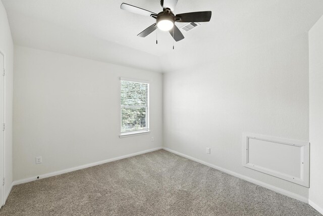 16413 Stonewall St, Conroe, TX 77303 - carpeted spare room featuring ceiling fan and baseboards