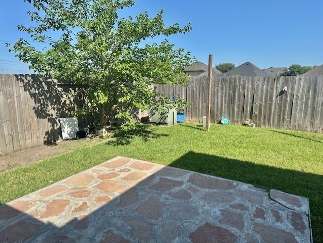 19522 Brighton Brook Ln, Richmond, TX 77407 - fenced backyard with a patio area