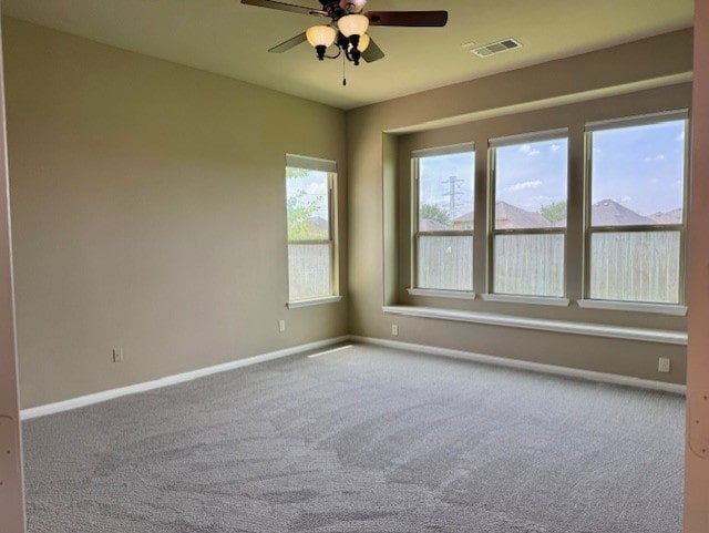 19522 Brighton Brook Ln, Richmond, TX 77407 - carpeted spare room with baseboards and ceiling fan