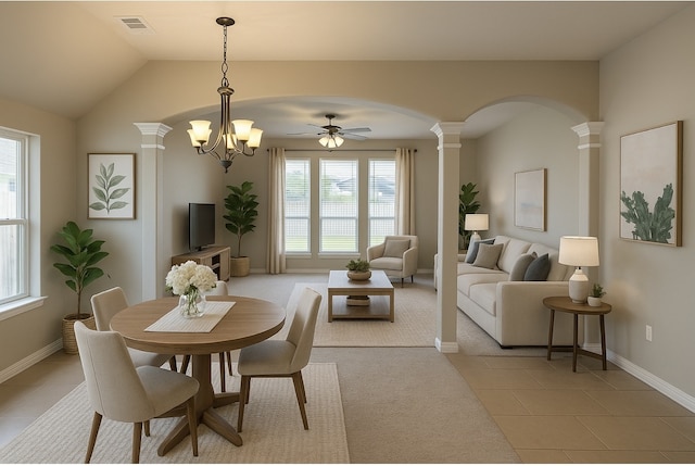 19522 Brighton Brook Ln, Richmond, TX 77407 - dining space with decorative columns, plenty of natural light, arched walkways, and vaulted ceiling