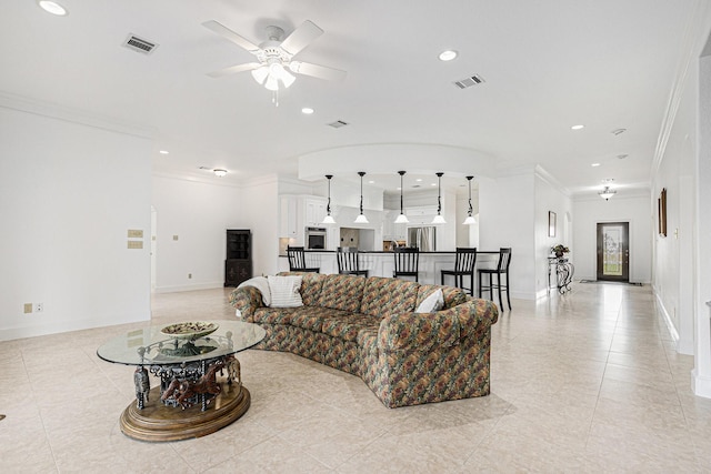 4606 Silhouette Dr, Katy, TX 77493 - living area featuring crown molding, light tile patterned floors, ceiling fan, and recessed lighting