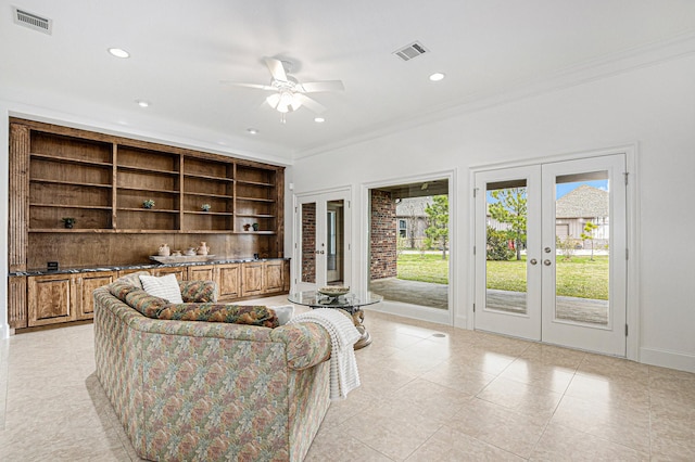 4606 Silhouette Dr, Katy, TX 77493 - living room with french doors, crown molding, a ceiling fan, light tile patterned floors, and recessed lighting