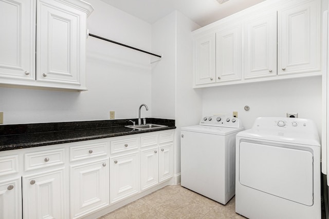 4606 Silhouette Dr, Katy, TX 77493 - washroom featuring washer and clothes dryer and cabinet space