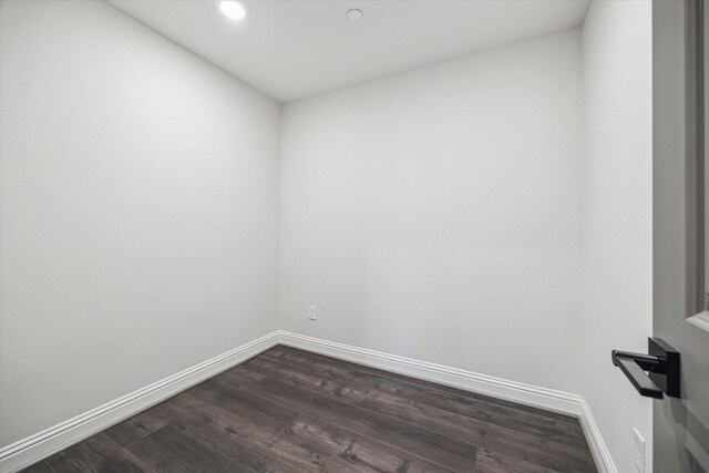 631 Rita Blanca Dr, Webster, TX 77598 - spare room with dark wood-style floors and recessed lighting